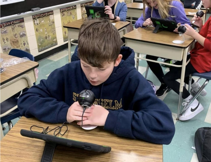 A student using the GarageBand app.